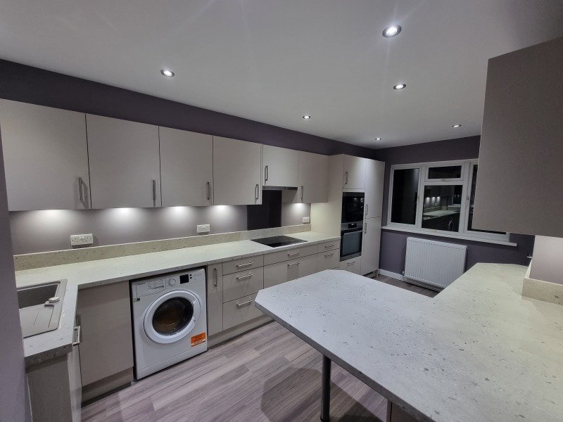Sophisticated lavender coloured kitchen walls